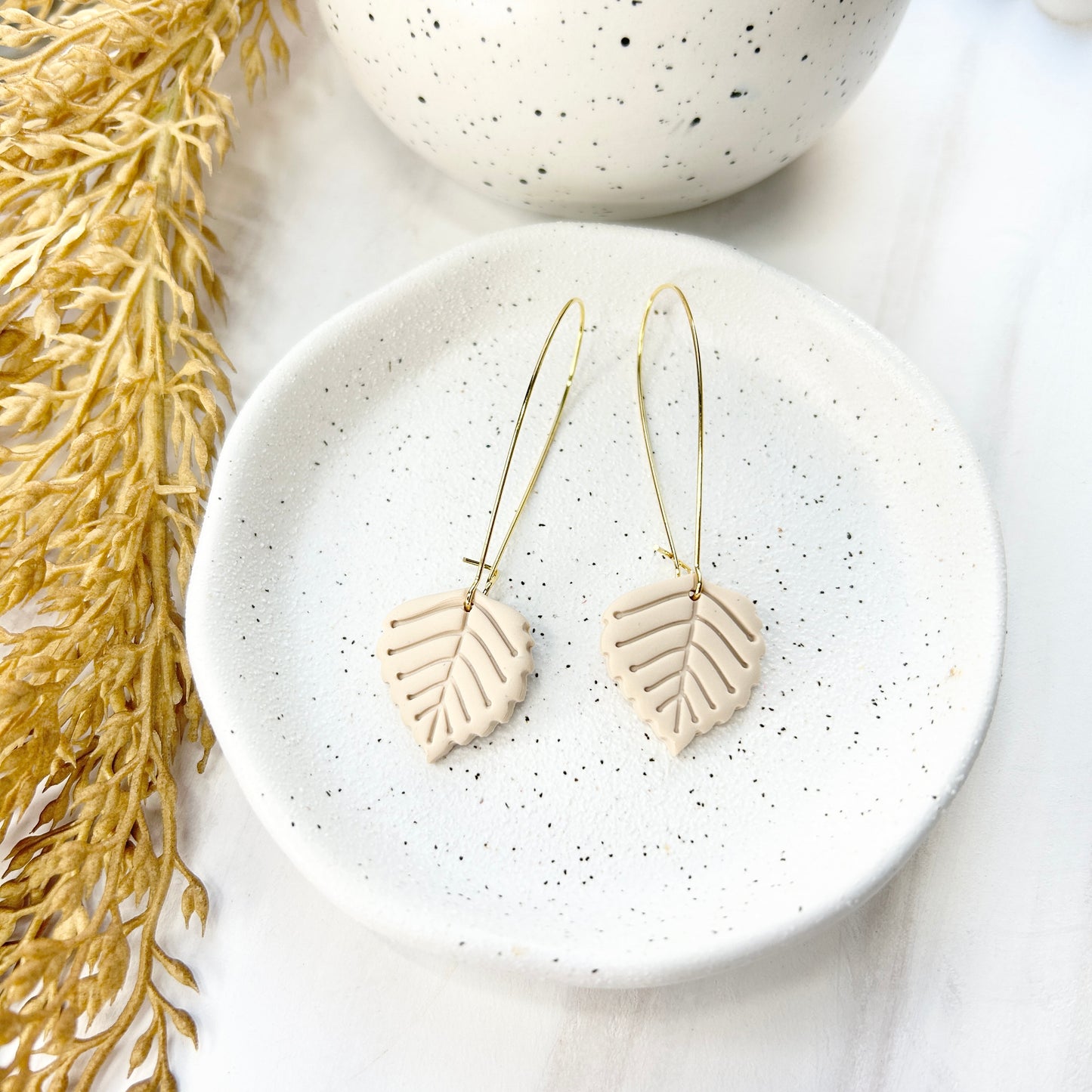 Autumn cream leaf, long gold plated kidney wire earrings