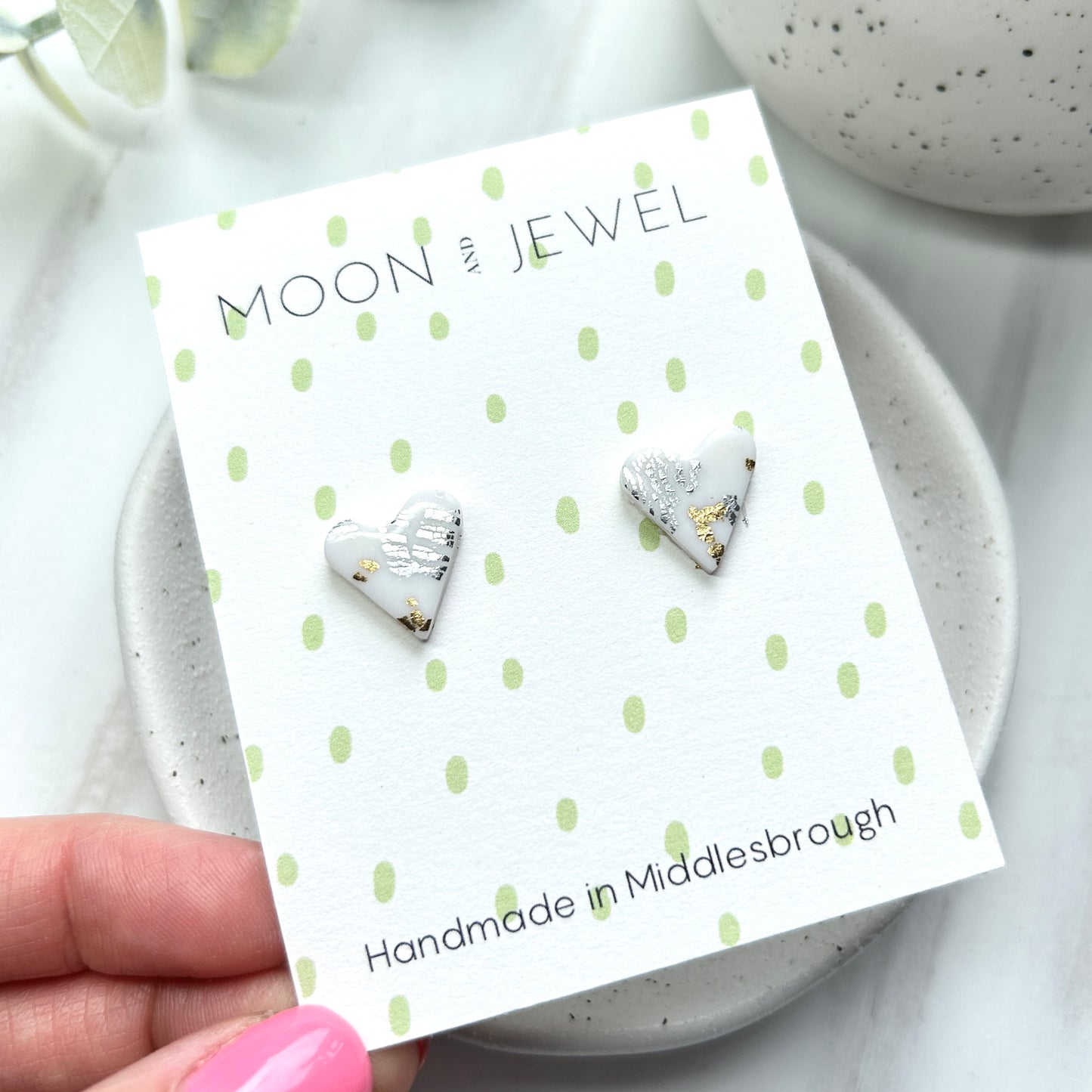 Handmade polymer clay heart studs with gold and silver leaf detail