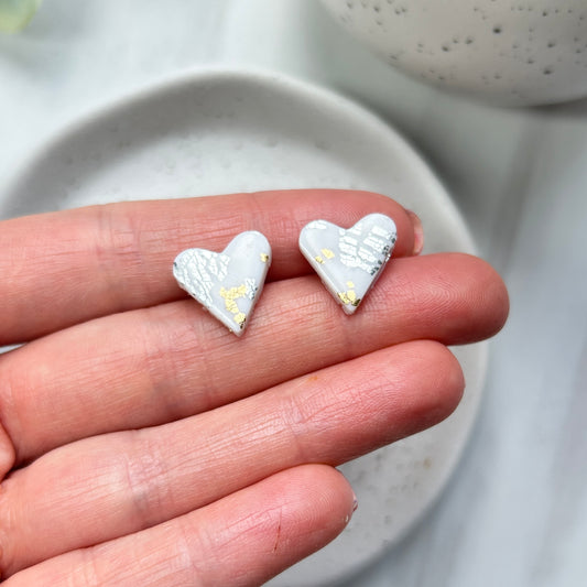 Handmade polymer clay heart studs with gold and silver leaf detail