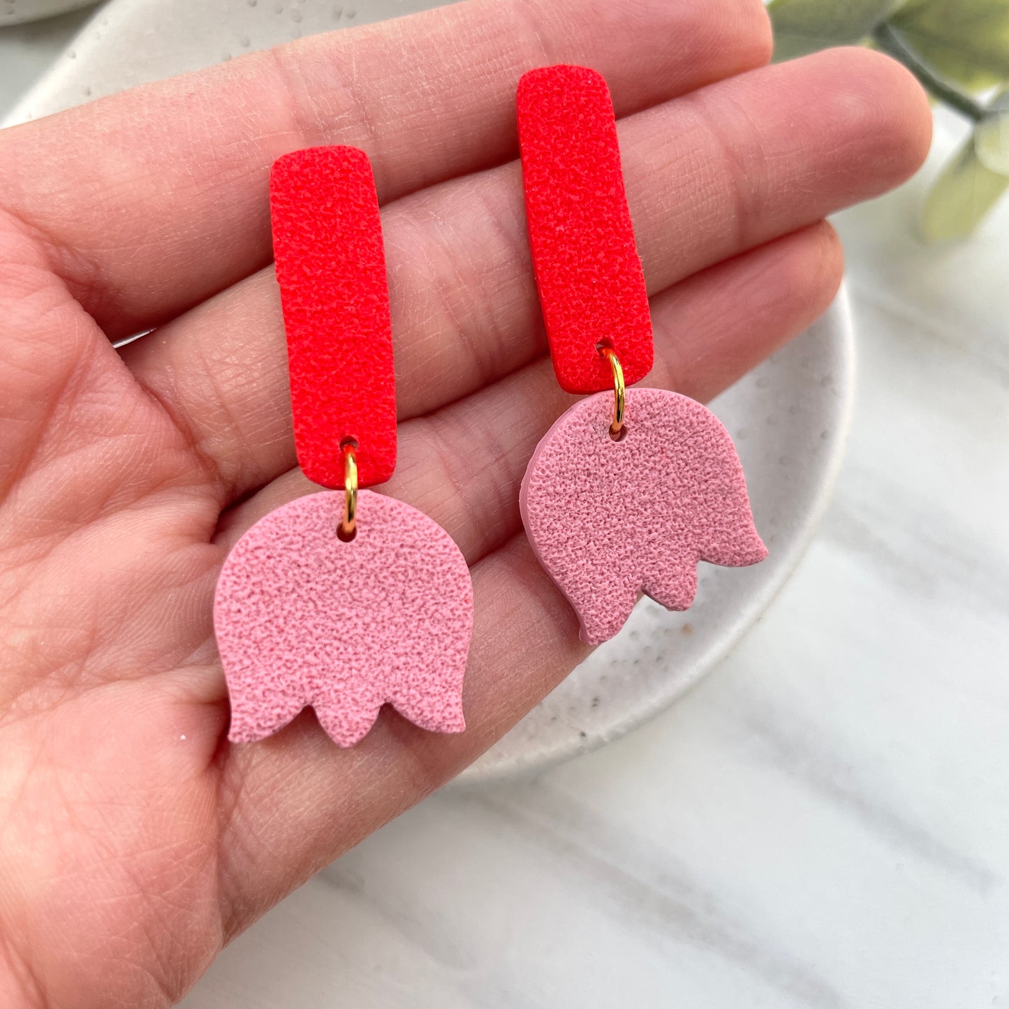 Red and pink polymer clay flower dangles